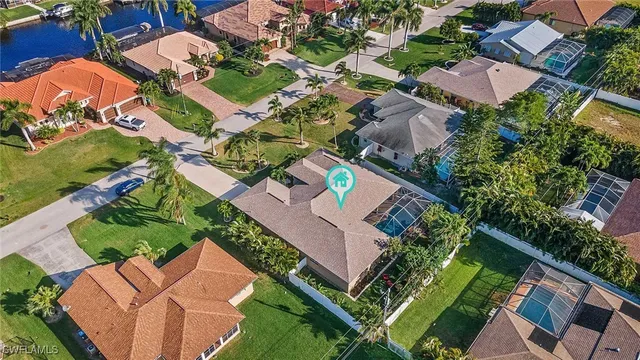 an aerial view of a house with a garden