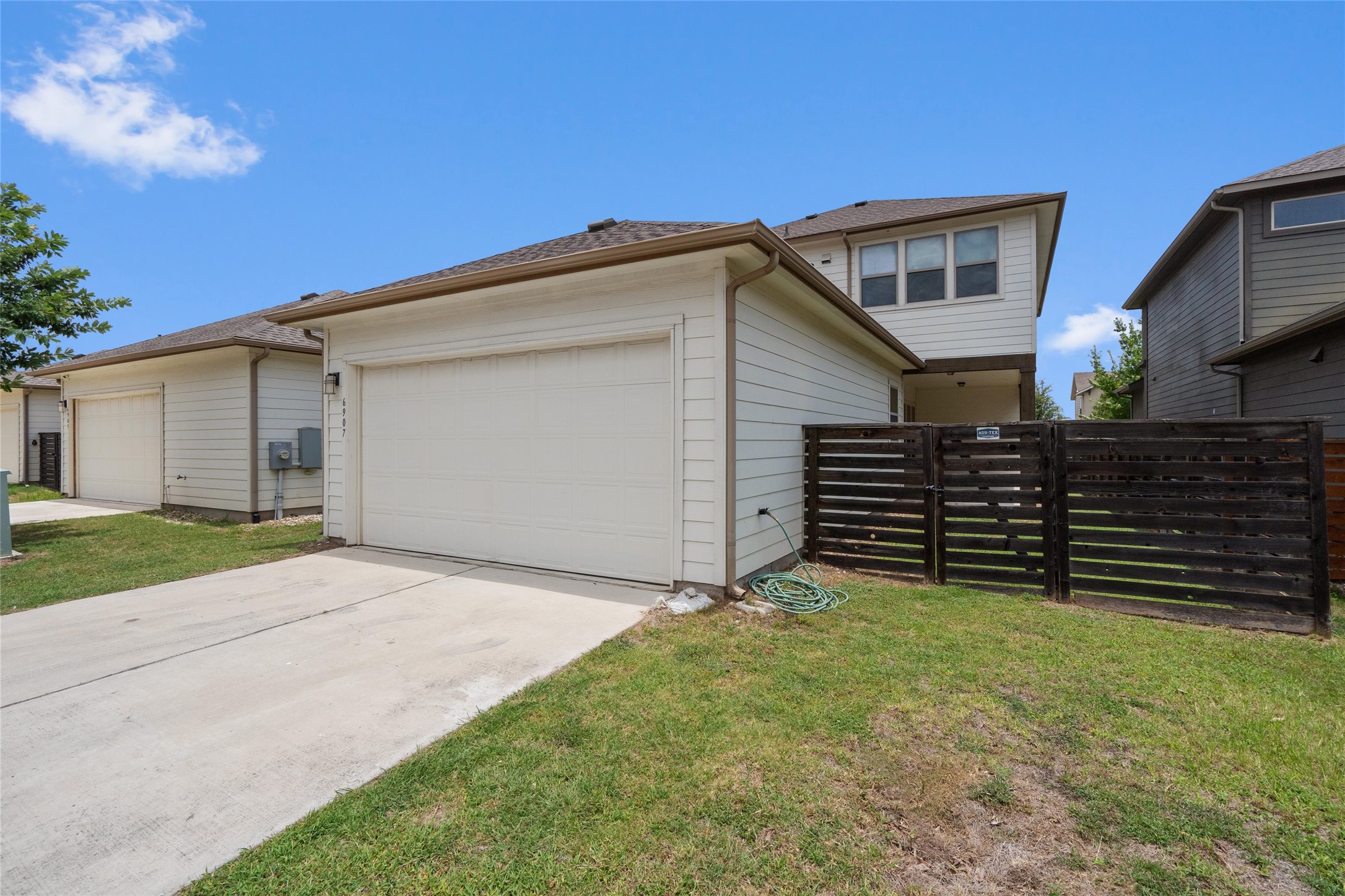 6907 Idea Road Austin, TX 78741 - Photo 30 of 36 a view of a house with a yard
