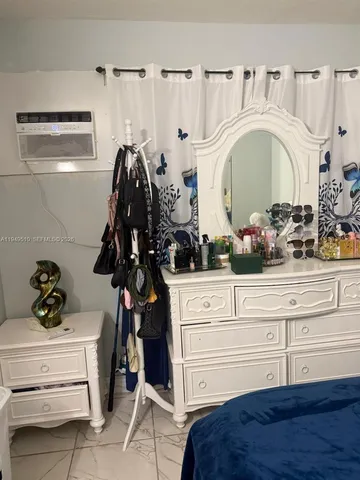 a bathroom with a sink and mirror