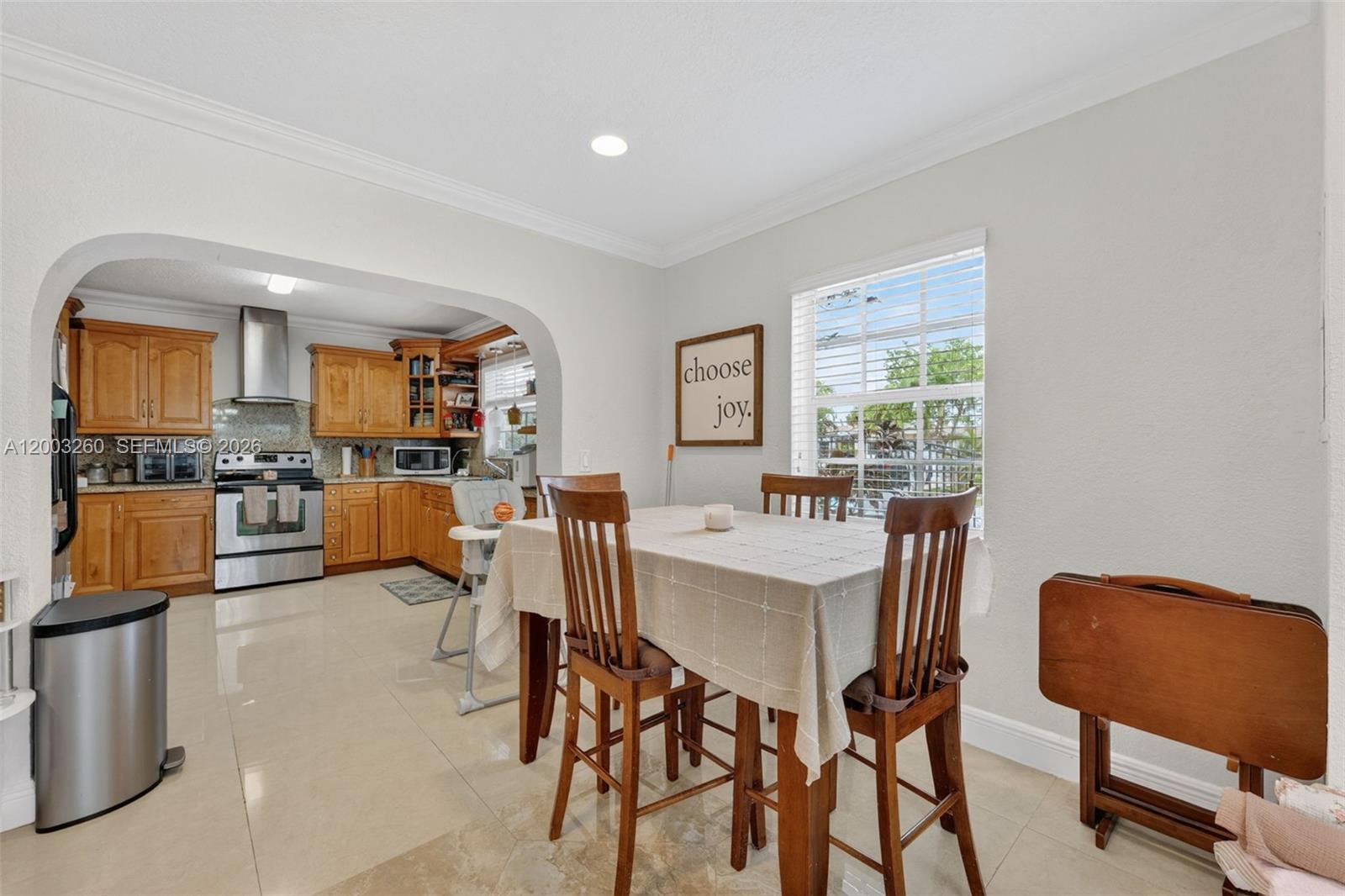 9000 Southwest 40th Terrace Miami, FL 33165 - Photo 5 of 23 a view of a dining room with furniture