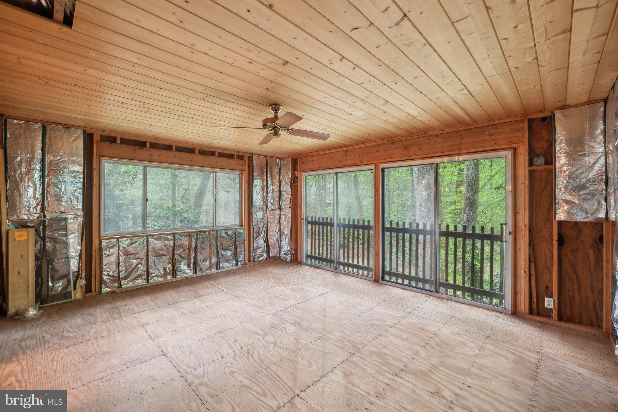 7604 Hackamore Drive Potomac, MD 20854 - Photo 11 of 56 Sunroom with beautiful view to nature