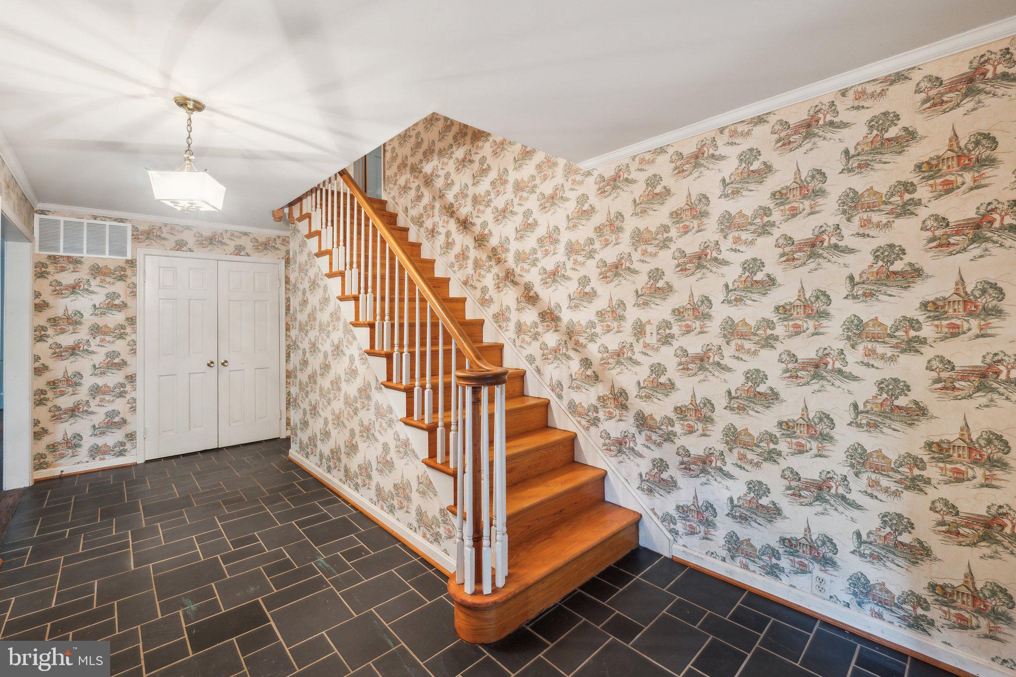 7604 Hackamore Drive Potomac, MD 20854 - Photo 14 of 56 a view of entryway with stairs