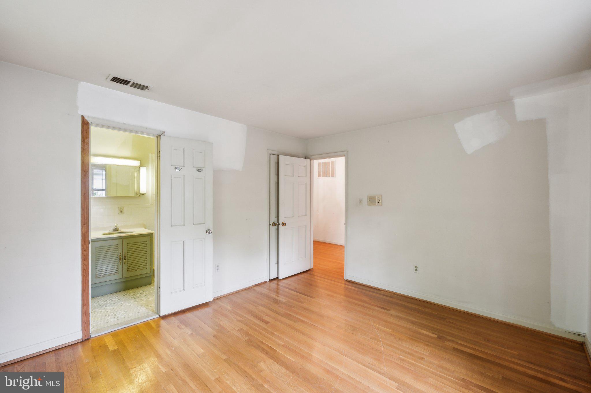 7604 Hackamore Drive Potomac, MD 20854 - Photo 23 of 56 a view of empty room with wooden floor