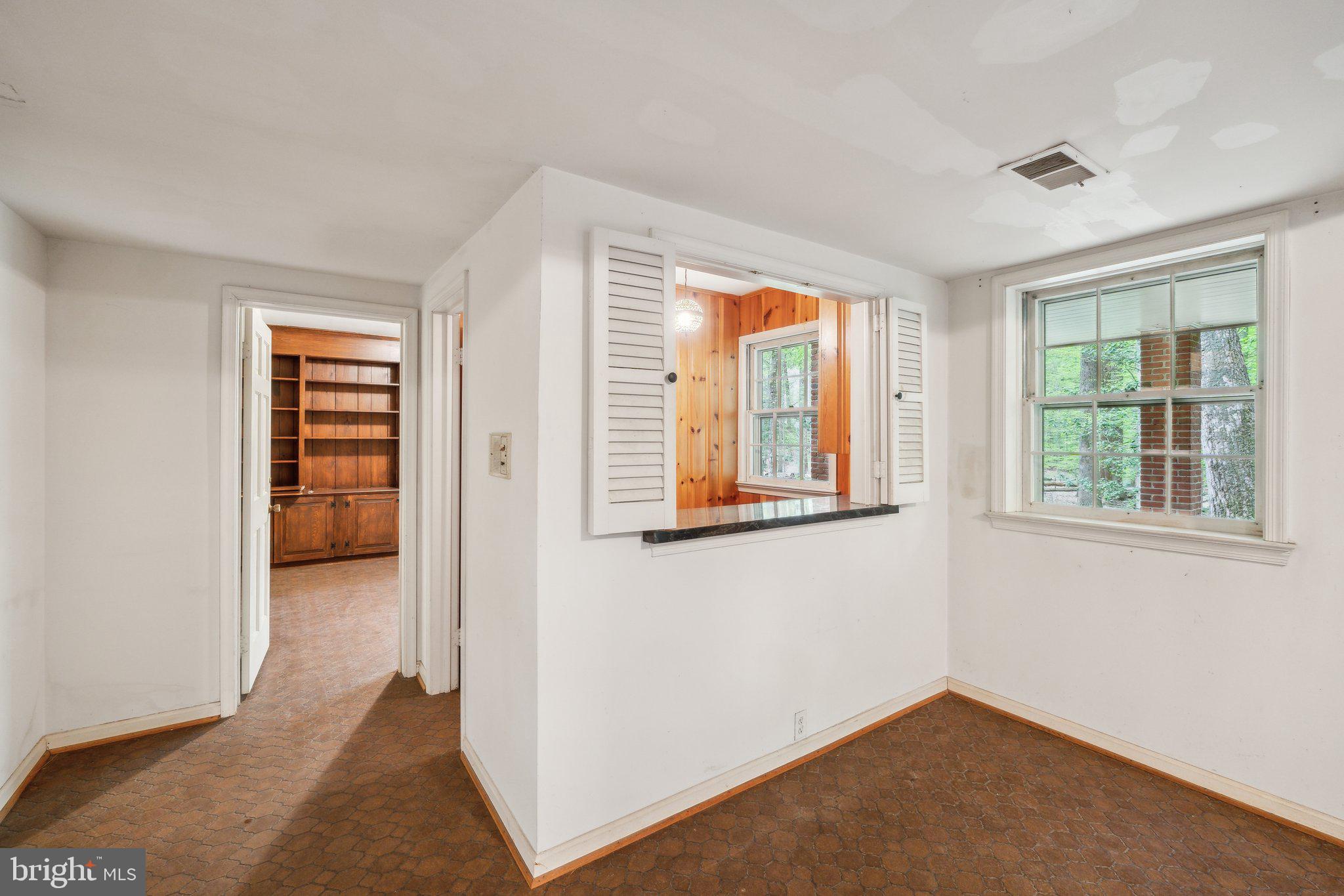 7604 Hackamore Drive Potomac, MD 20854 - Photo 33 of 56 wooden floor in an empty room with a window