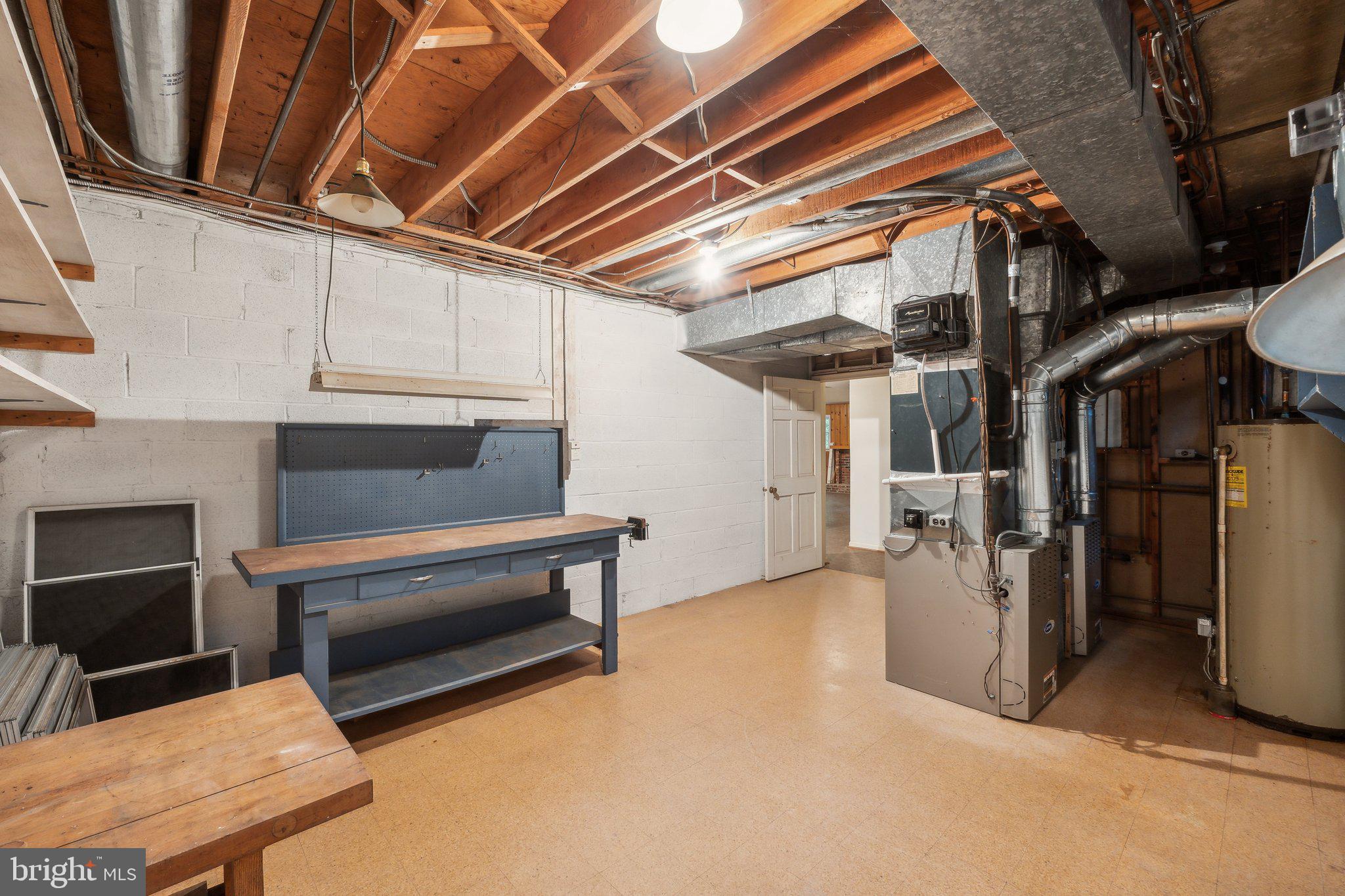 7604 Hackamore Drive Potomac, MD 20854 - Photo 40 of 56 Utility Room with workshop
