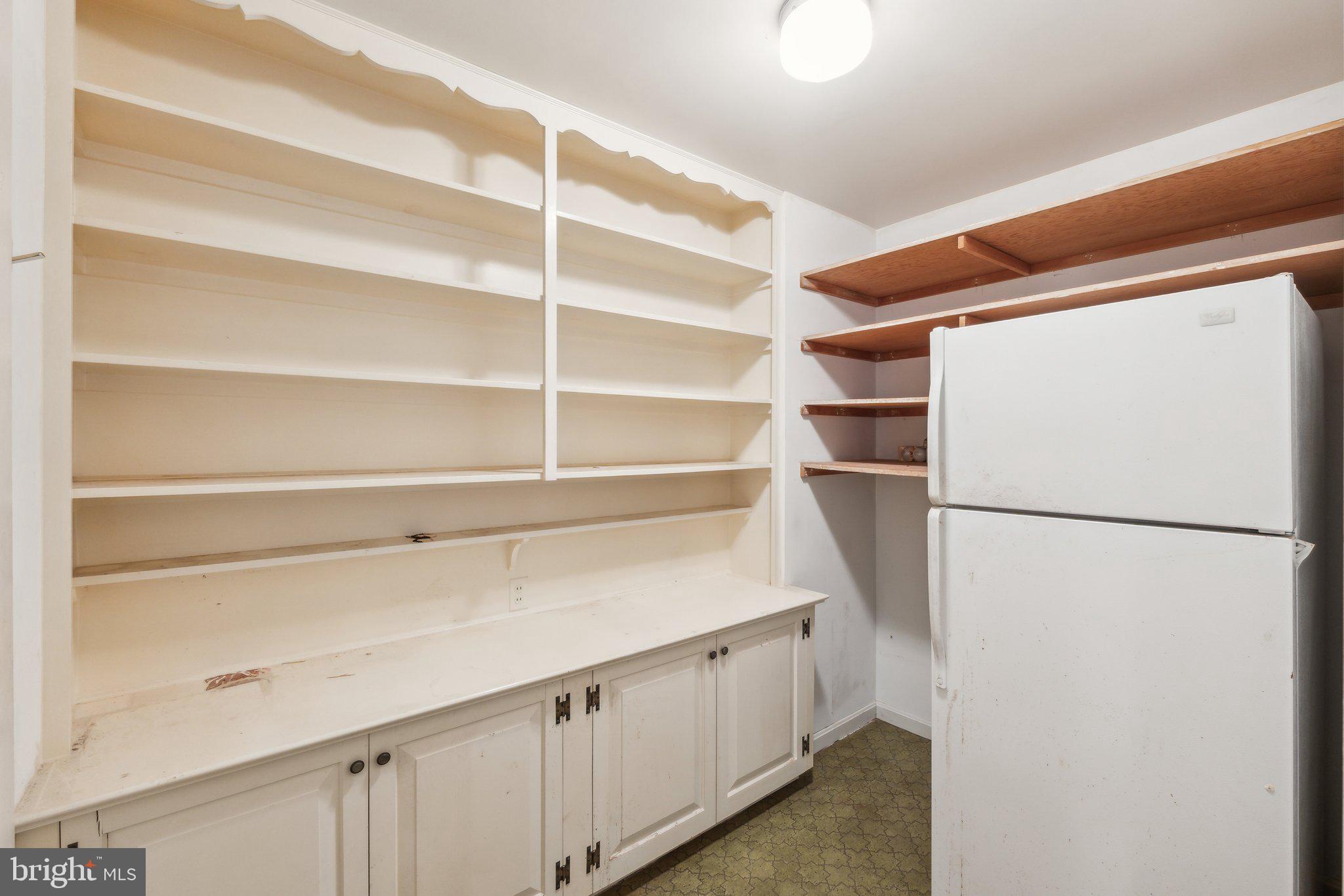 7604 Hackamore Drive Potomac, MD 20854 - Photo 6 of 56 a view of walk in closet with empty racks
