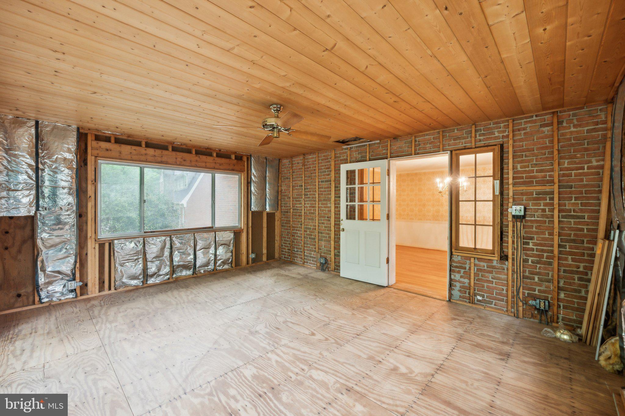 7604 Hackamore Drive Potomac, MD 20854 - Photo 10 of 56 a view of an empty room with windows