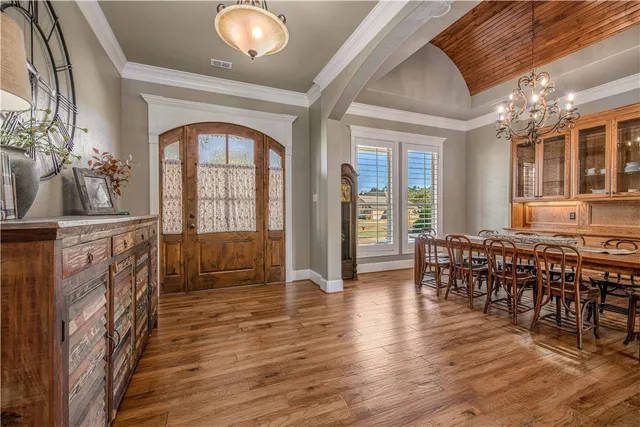 a view of a livingroom with furniture window and wooden floor
