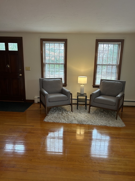 200 Plympton Road, Unit 200 Plymouth, MA 02360 - Photo 5 of 10 a living room with furniture and a window