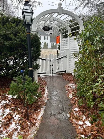 a view of a backyard of the house