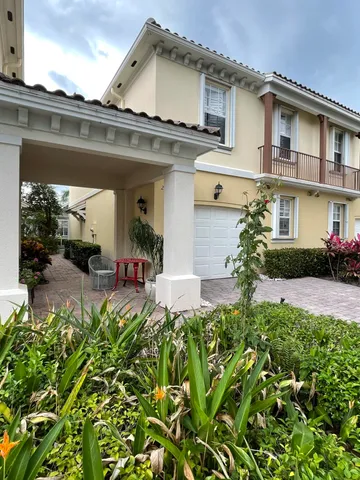 front view of a house with a small yard