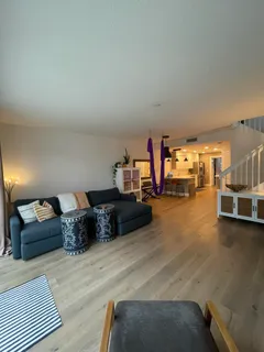 a bedroom with furniture and a couch