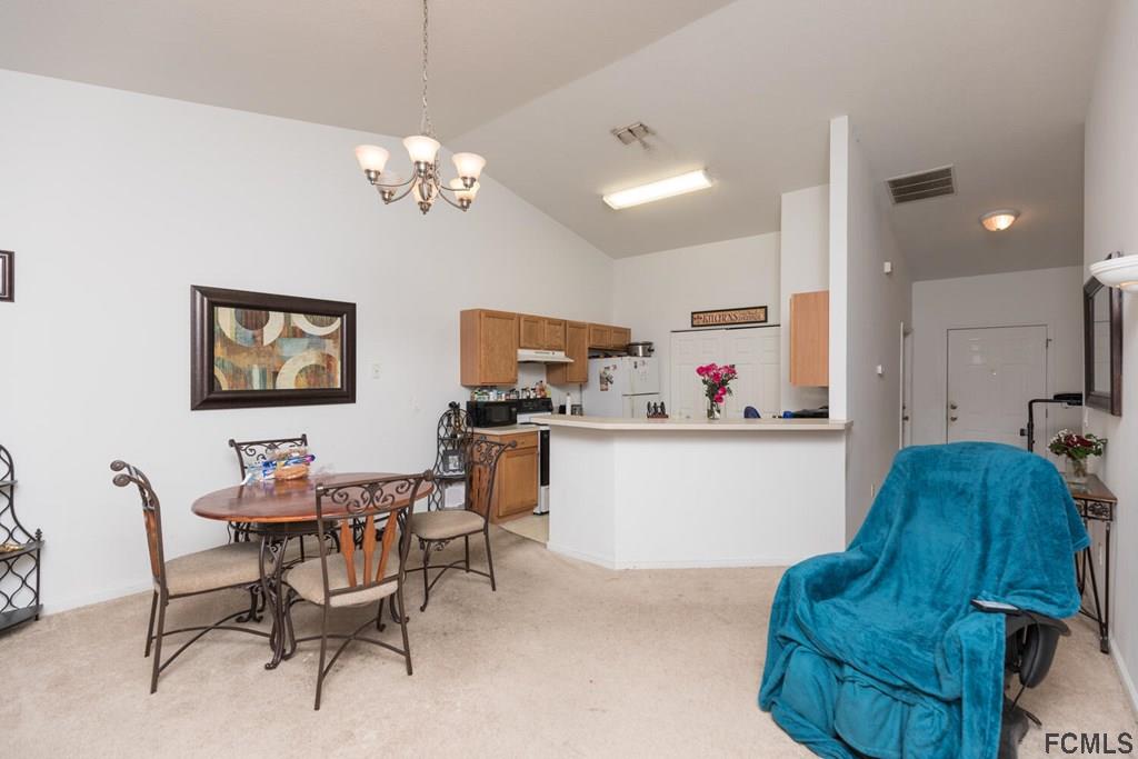 23 Freneau Lane Palm Coast, FL 32137 - Photo 14 of 44 View into Kitchen