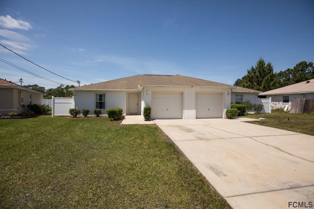 23 Freneau Lane Palm Coast, FL 32137 - Photo 4 of 44 Front View