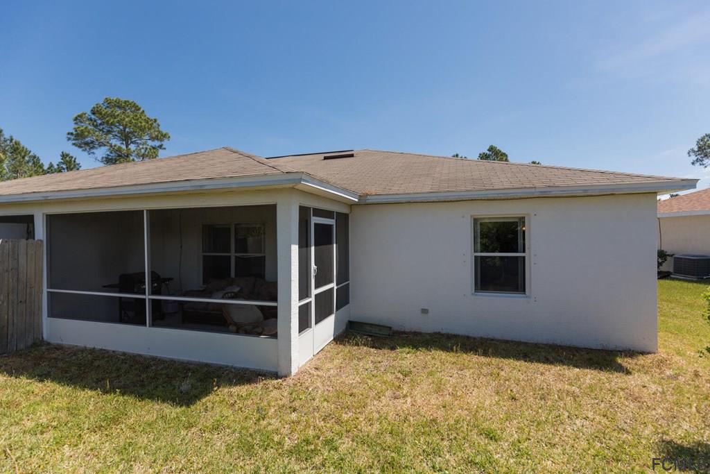 23 Freneau Lane Palm Coast, FL 32137 - Photo 40 of 44 Screened Back Porch
