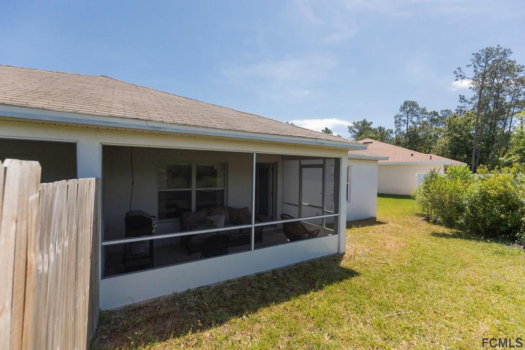 23 Freneau Lane Palm Coast, FL 32137 - Photo 41 of 44 Screened Back Porch