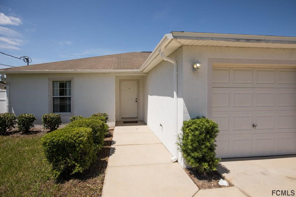 23 Freneau Lane Palm Coast, FL 32137 - Photo 7 of 44 Entrance to Unit A