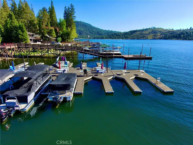 a view of a swimming pool with a table and chairs