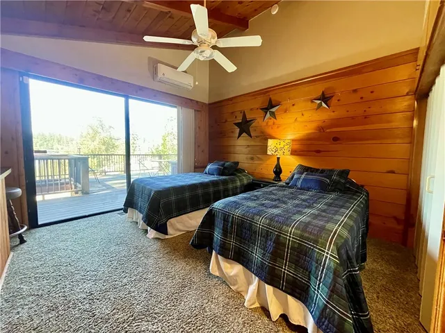 a bathroom with a double vanity sink toilet and shower