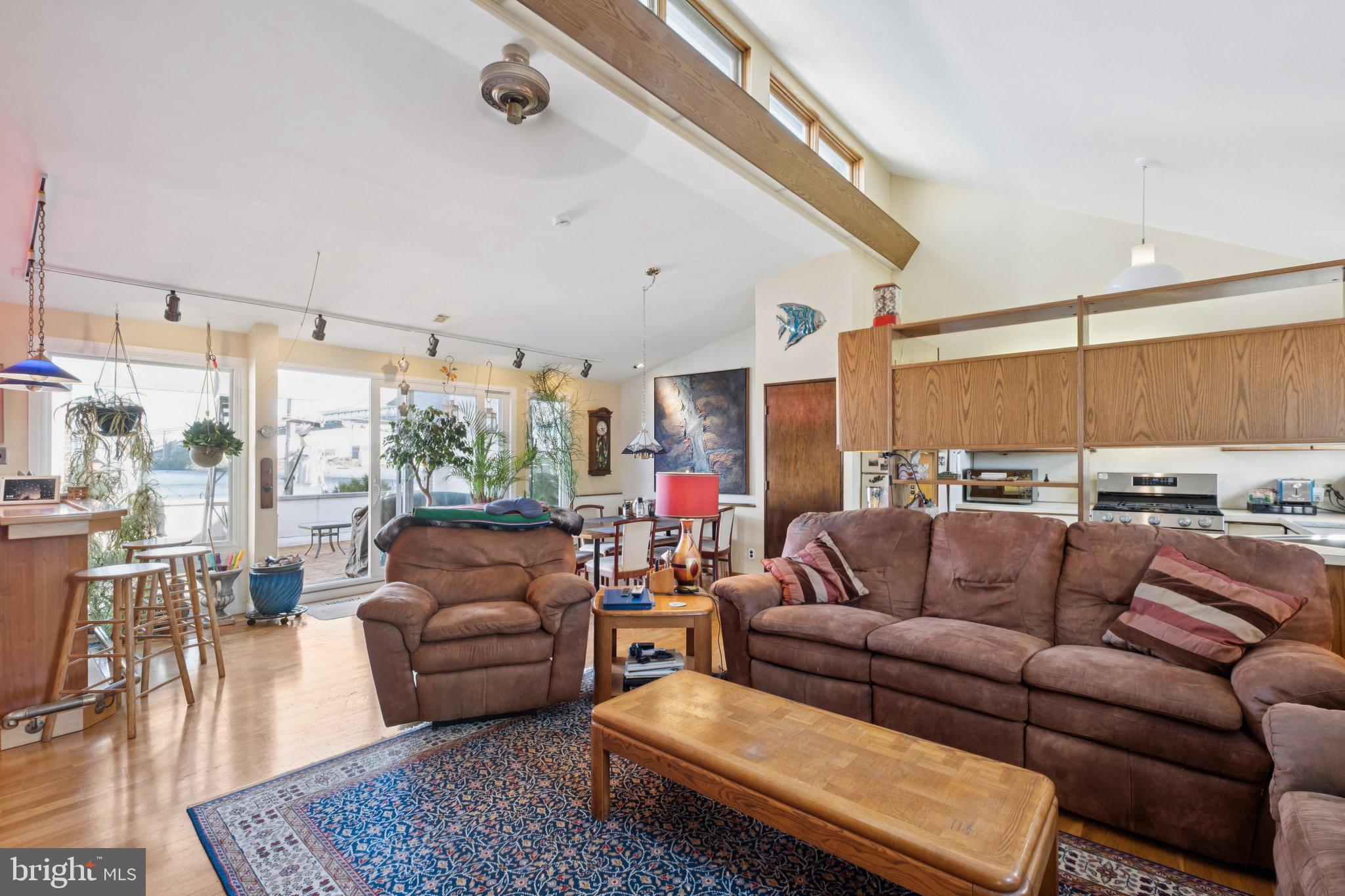 315 North Front Street, Unit 315 Philadelphia, PA 19106 - Photo 13 of 39 a living room with furniture and a large window
