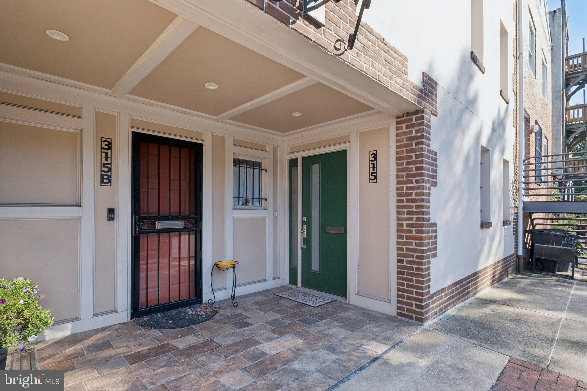 315 North Front Street, Unit 315 Philadelphia, PA 19106 - Photo 21 of 39 a view of a hallway with wooden walls