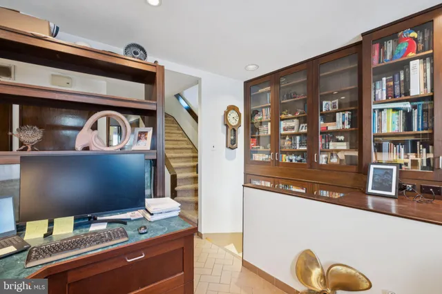 a bathroom with a sink a mirror and a tub