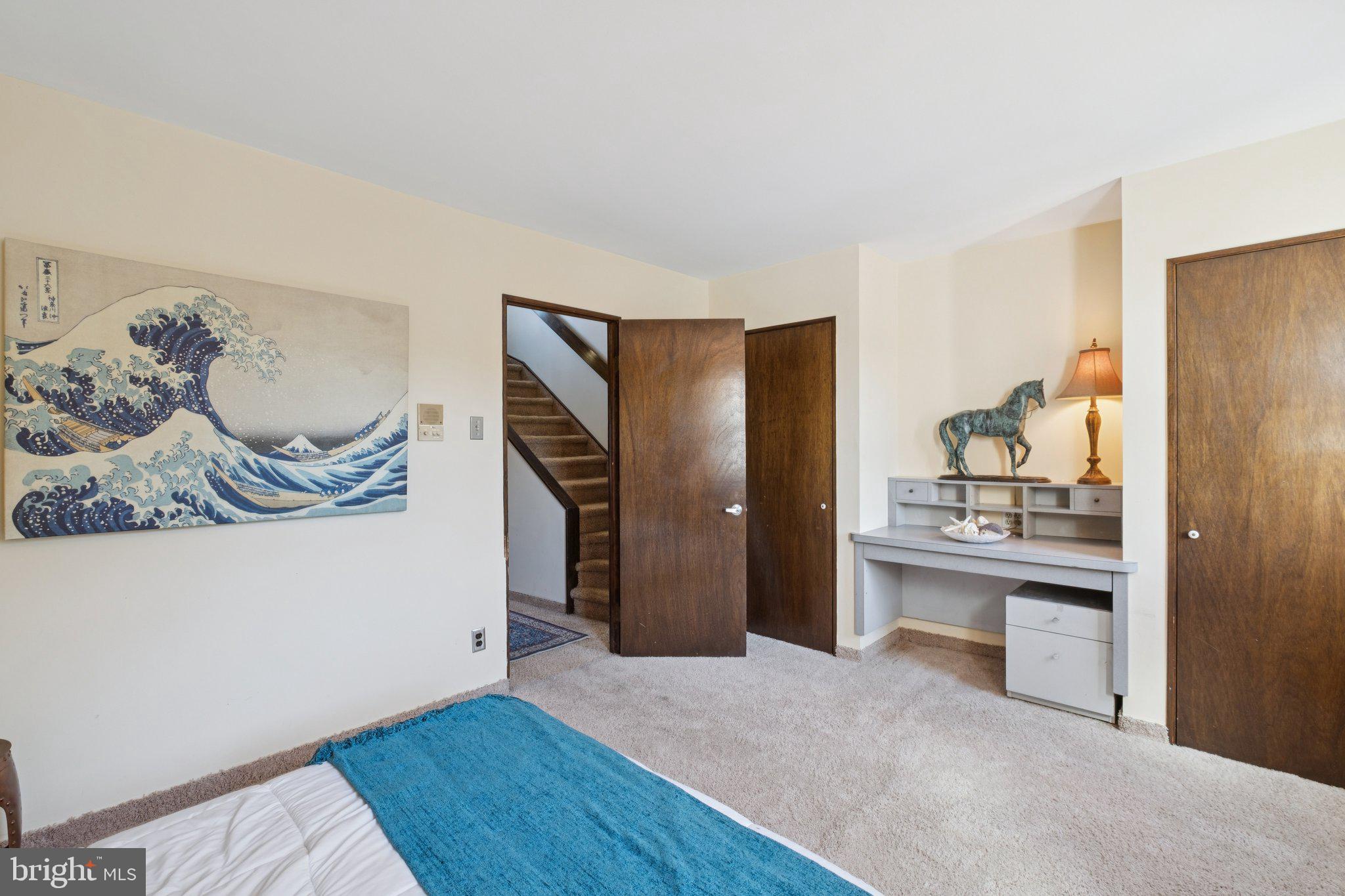 315 North Front Street, Unit 315 Philadelphia, PA 19106 - Photo 6 of 39 a kitchen with stainless steel appliances kitchen island granite countertop a refrigerator and a sink