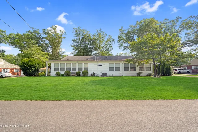 a view of a house with a garden