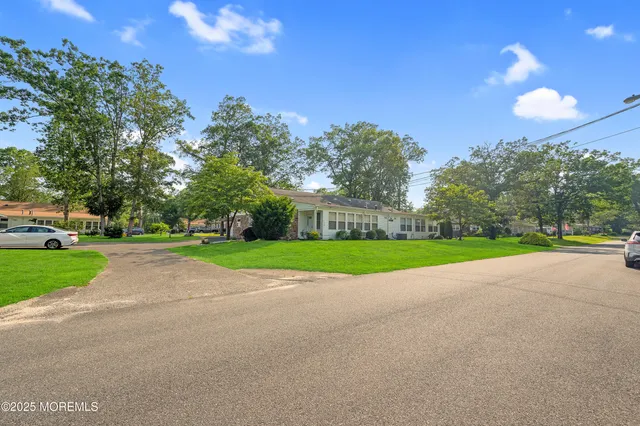 a view of road with trees