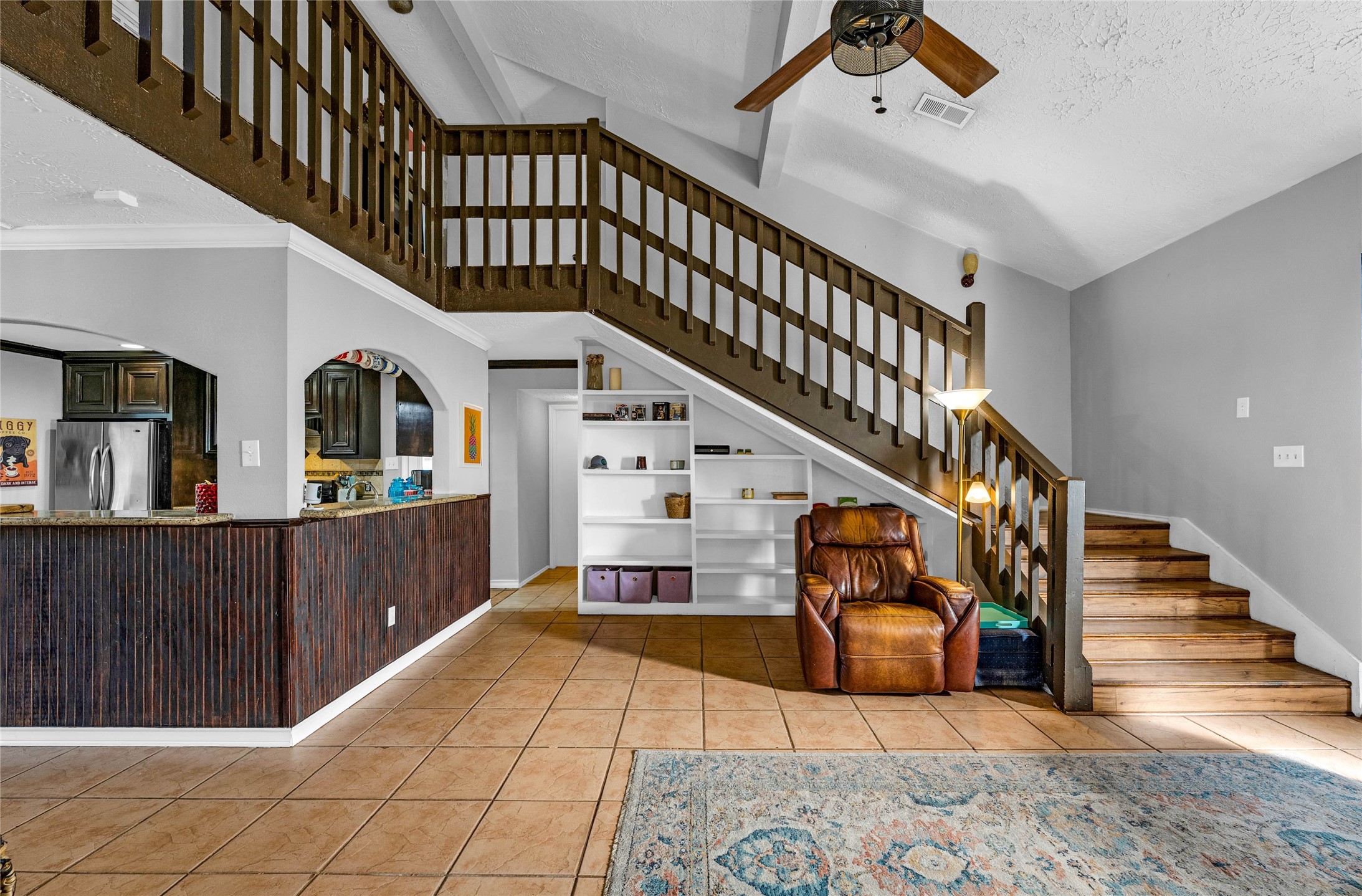 24014 Red Sky Drive Spring, TX 77373 - Photo 13 of 23 a view of entryway dining room and hall with wooden floor