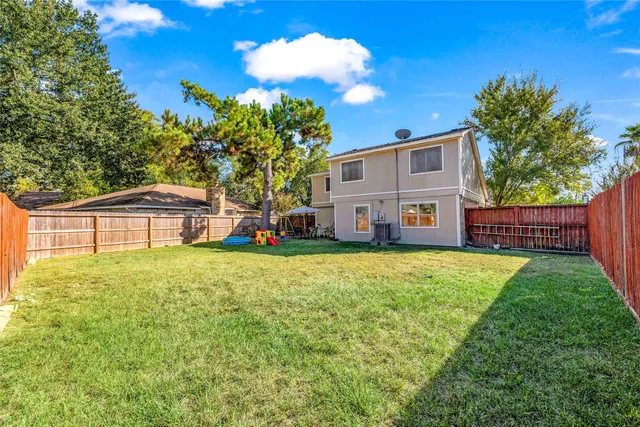 a house view with a garden space
