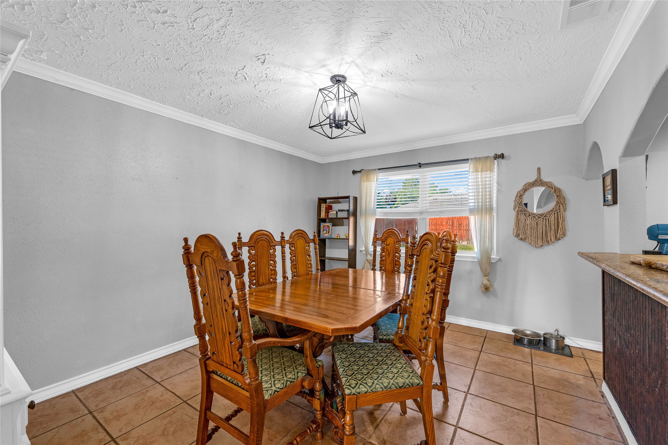 24014 Red Sky Drive Spring, TX 77373 - Photo 6 of 23 a dining room with furniture a chandelier and window