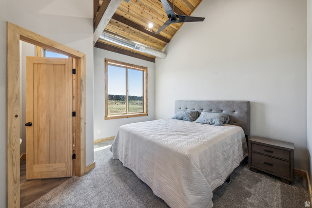 46997 West Thunder Road Fruitland, UT 84027 - Photo 24 of 49 Carpeted bedroom with a wood ceiling with exposed beams and high vaulted ceiling