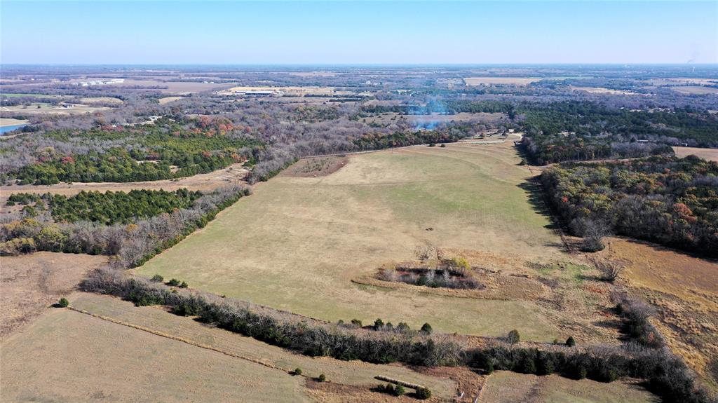 Tbd Pilot Grove Road Whitewright, TX 75491 - Photo 8 of 23 an aerial view of a house with a yard