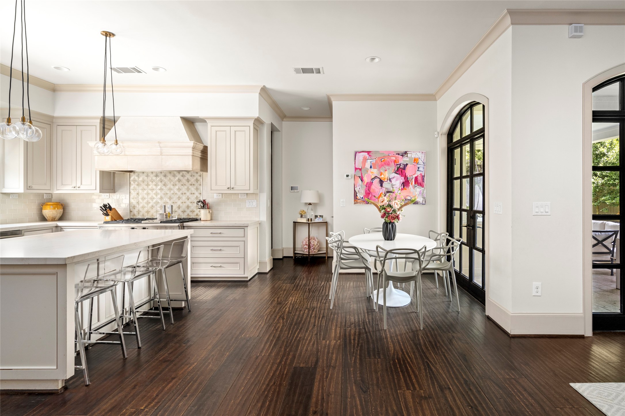 2216 Stanmore Drive Houston, TX 77019 - Photo 19 of 46 A bright kitchen and breakfast area connect seamlessly to the family room and outdoor living spaces, creating an easy flow for everyday living and entertaining.