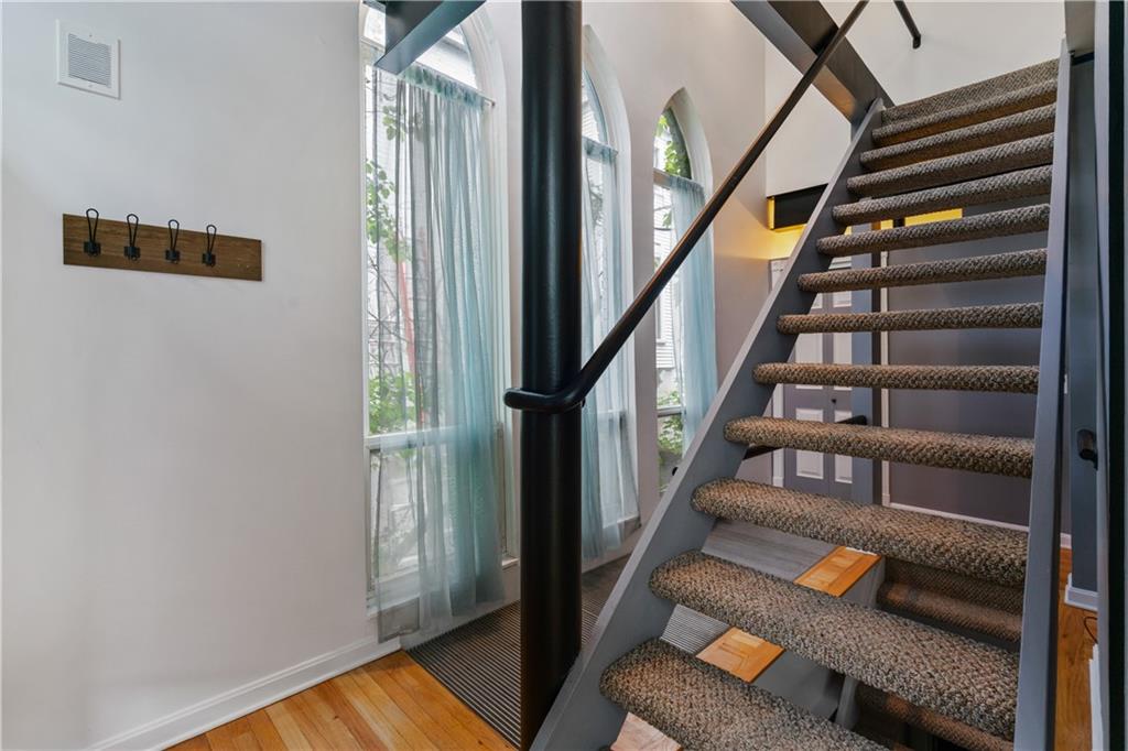 675 College Street, Unit A Pittsburgh, PA 15232 - Photo 13 of 28 a view of entryway and hall with wooden floor