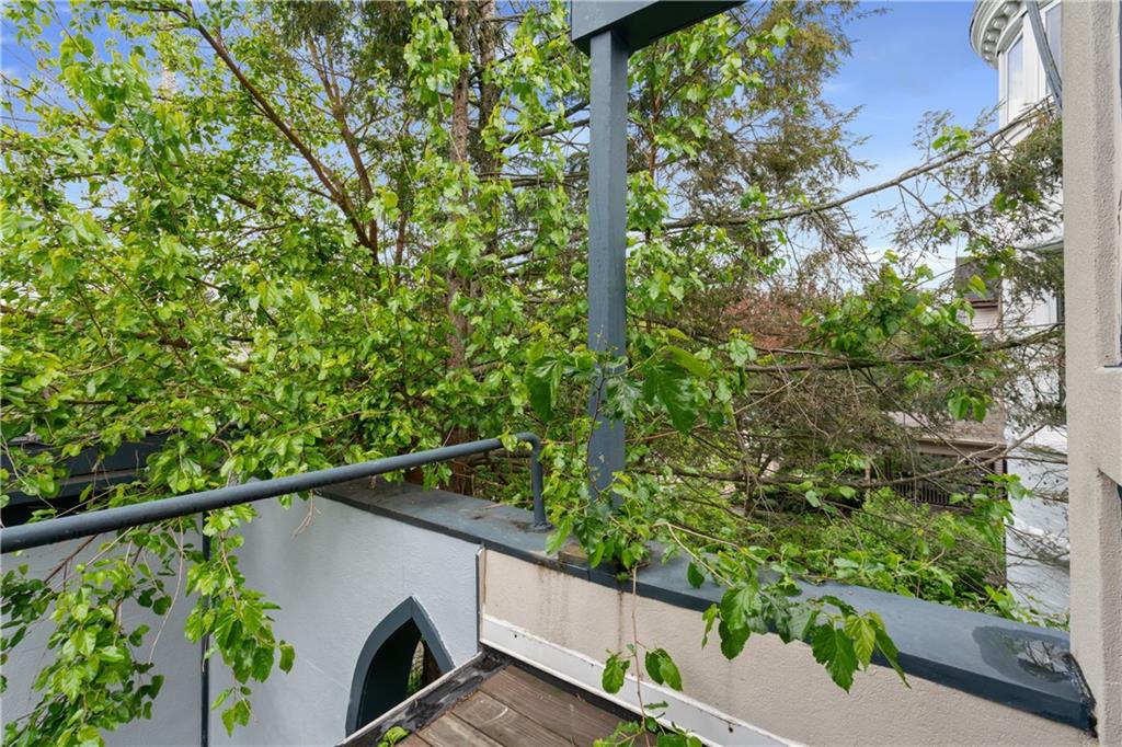 675 College Street, Unit A Pittsburgh, PA 15232 - Photo 17 of 28 a view of a balcony with plants