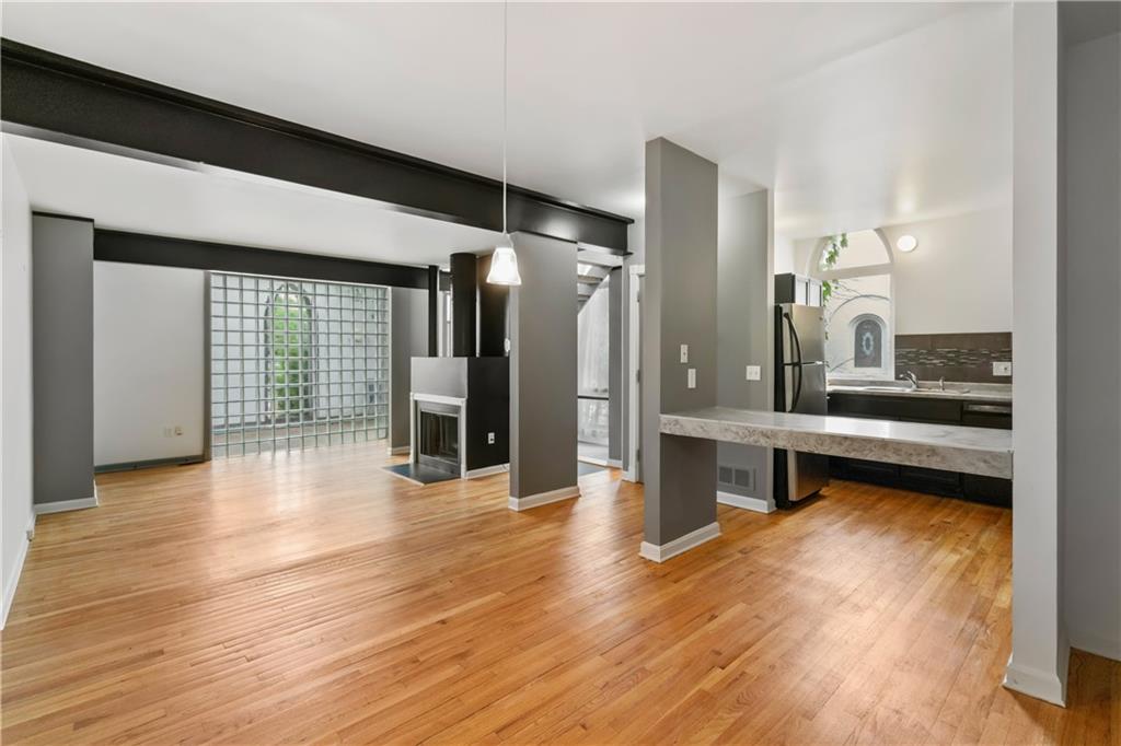 675 College Street, Unit A Pittsburgh, PA 15232 - Photo 6 of 28 a view of a room with wooden floor and furniture