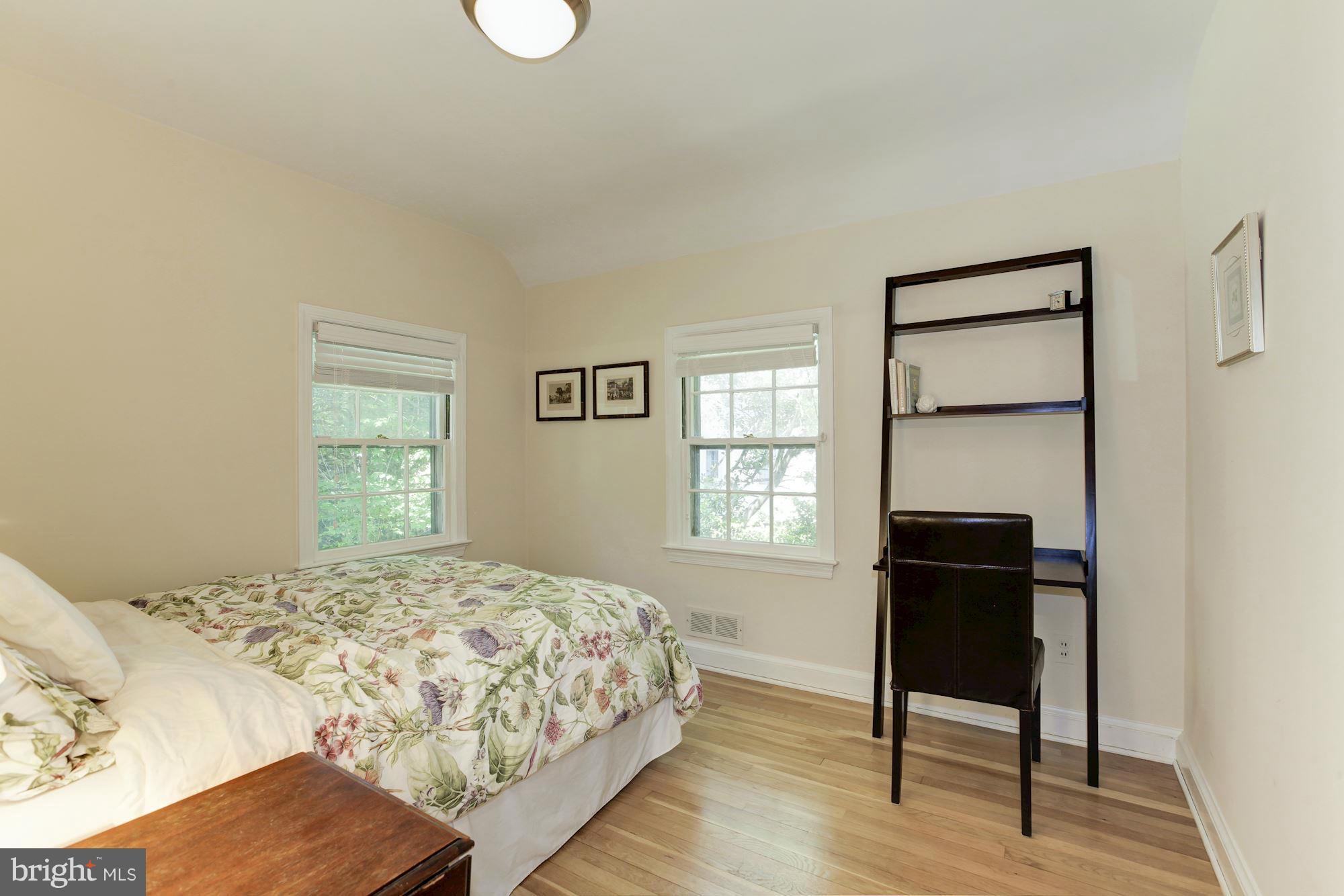 5608 Pollard Road Bethesda, MD 20816 - Photo 11 of 18 a bedroom with a bed and a window