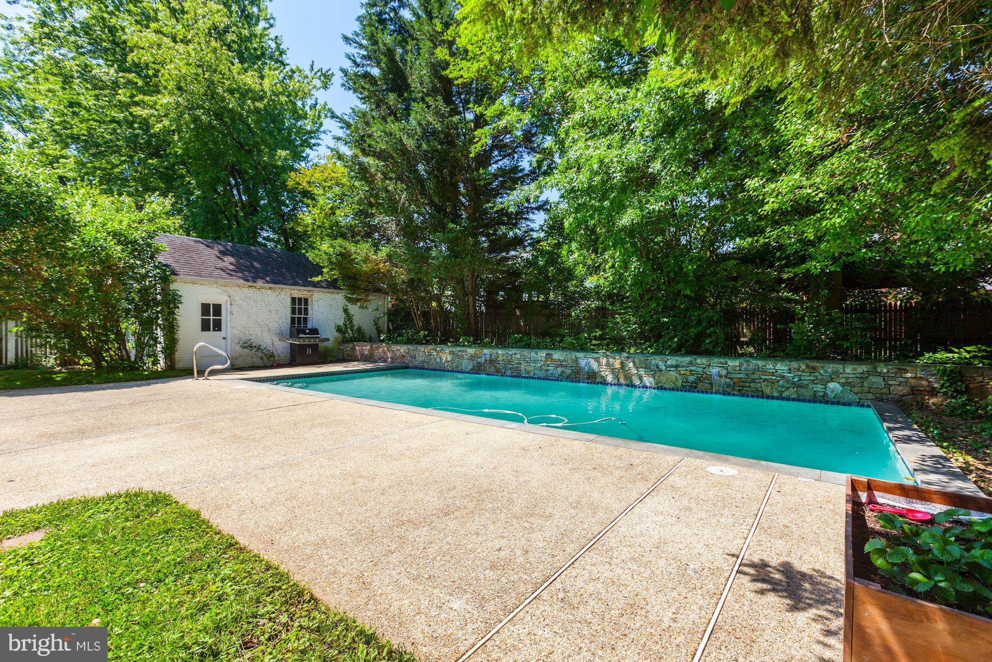 5608 Pollard Road Bethesda, MD 20816 - Photo 16 of 18 a house with garden in front of it