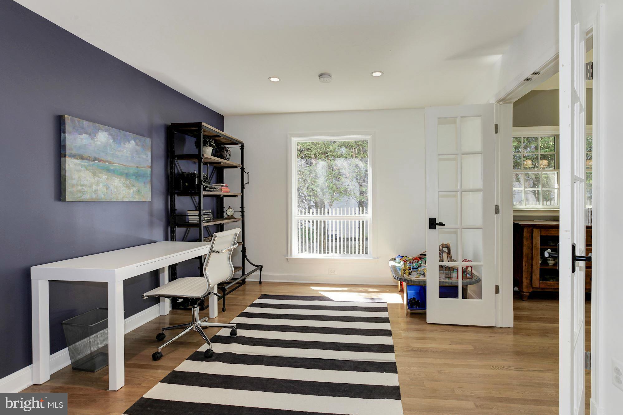 5608 Pollard Road Bethesda, MD 20816 - Photo 4 of 18 a view of entryway and hall with wooden floor