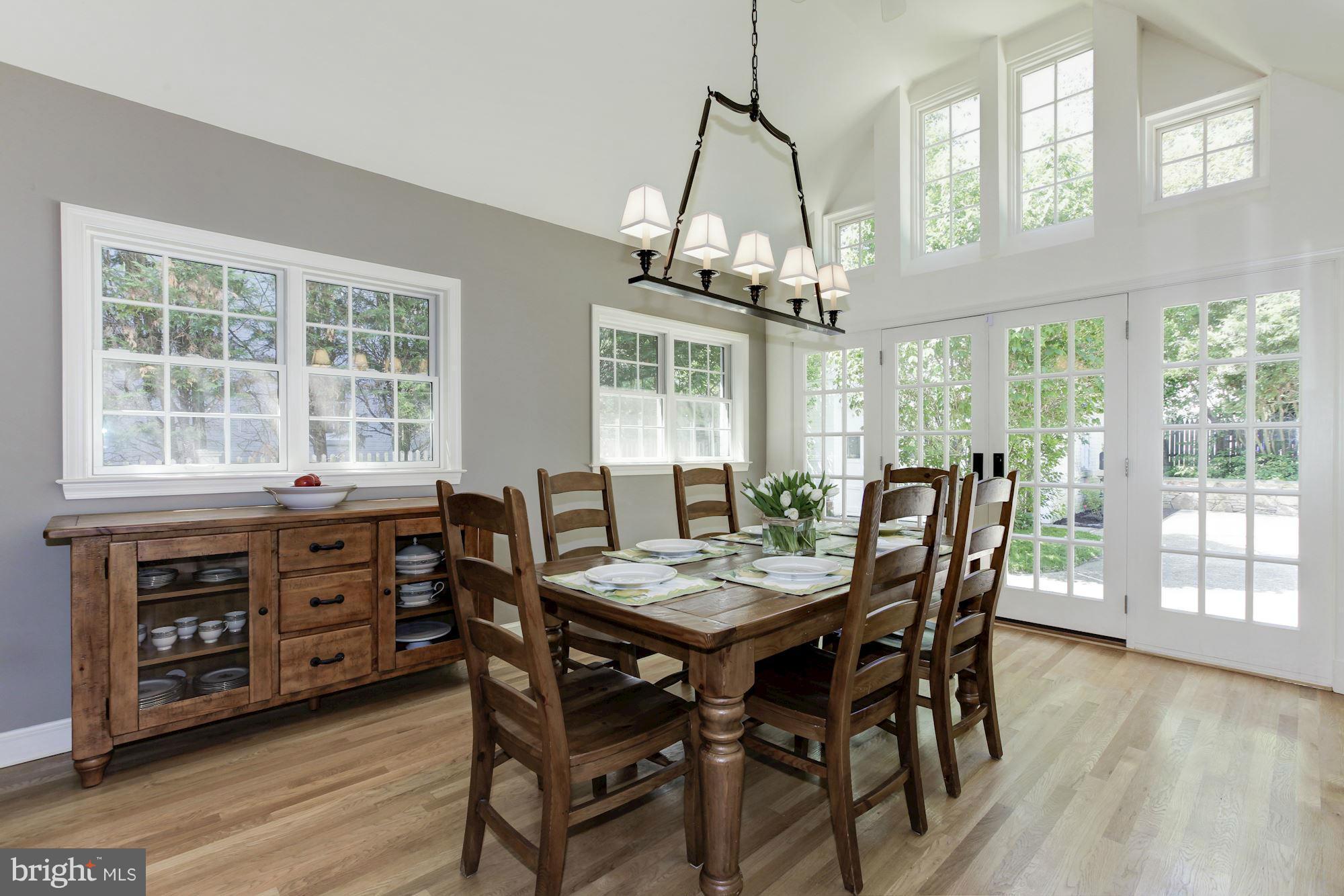 5608 Pollard Road Bethesda, MD 20816 - Photo 5 of 18 a view of a dining room with furniture window and wooden floor