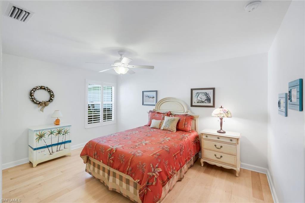 3609 Exuma Way Naples, FL 34119 - Photo 25 of 43 a bedroom with a bed and window