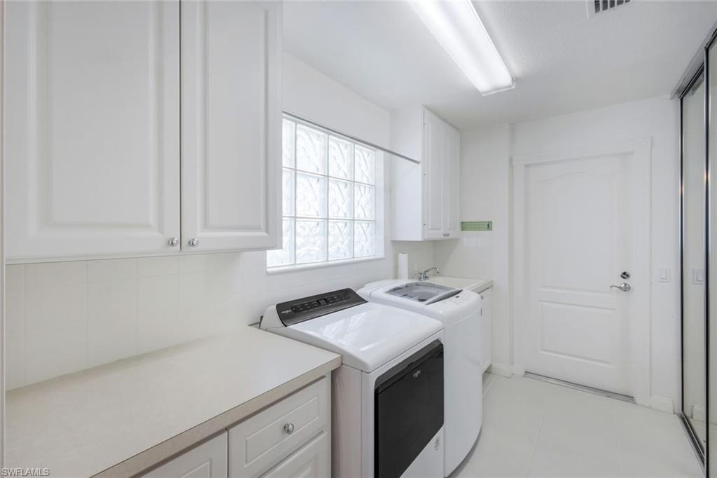 3609 Exuma Way Naples, FL 34119 - Photo 27 of 43 a room with storage and utility