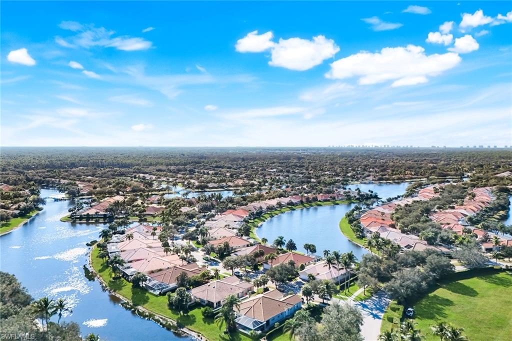 3609 Exuma Way Naples, FL 34119 - Photo 38 of 43 an aerial view of residential houses with outdoor space