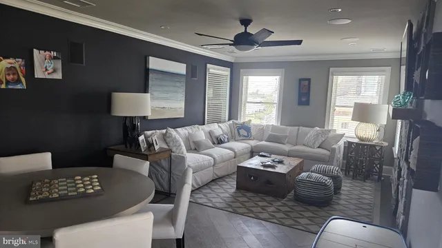 a large bed sitting in a bedroom next to a window