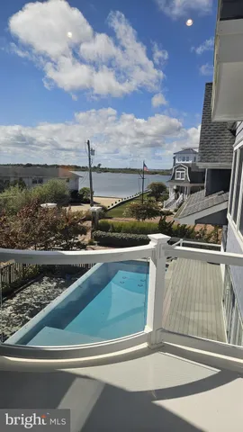 a bathroom with a sink double vanity and a mirror