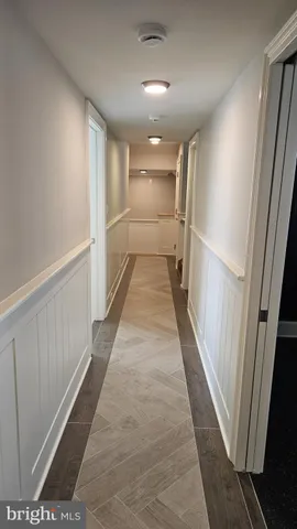 a bedroom with a bed and flat screen tv