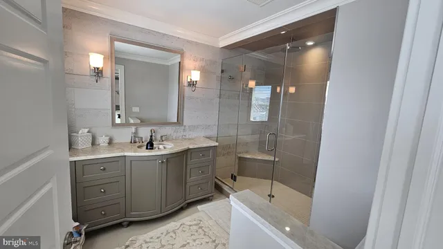 a kitchen with stainless steel appliances granite countertop a stove and a refrigerator
