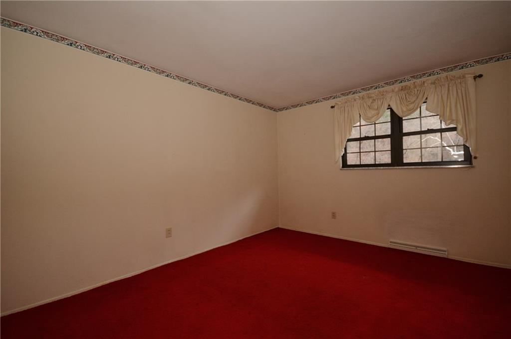 217 Segar Road Pittsburgh, PA 15243 - Photo 18 of 25 Second bedroom has rug covering wood floors. Add your own decorating ideas.
